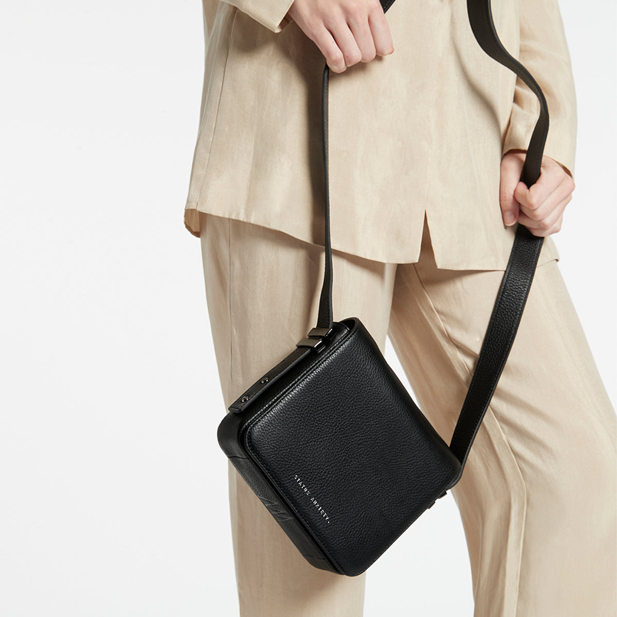 Status anxiety crossbody online bag